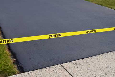 Sealing Your Asphalt Driveway in St. Joseph, MO: Protect and Prolong its Lifespan — McFadden..